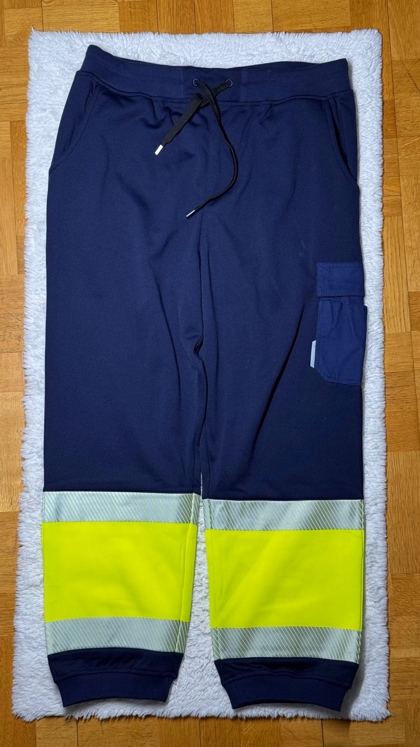 Työ-/huomiotyöhousut tummansiniset keltaisilla heijastimilla